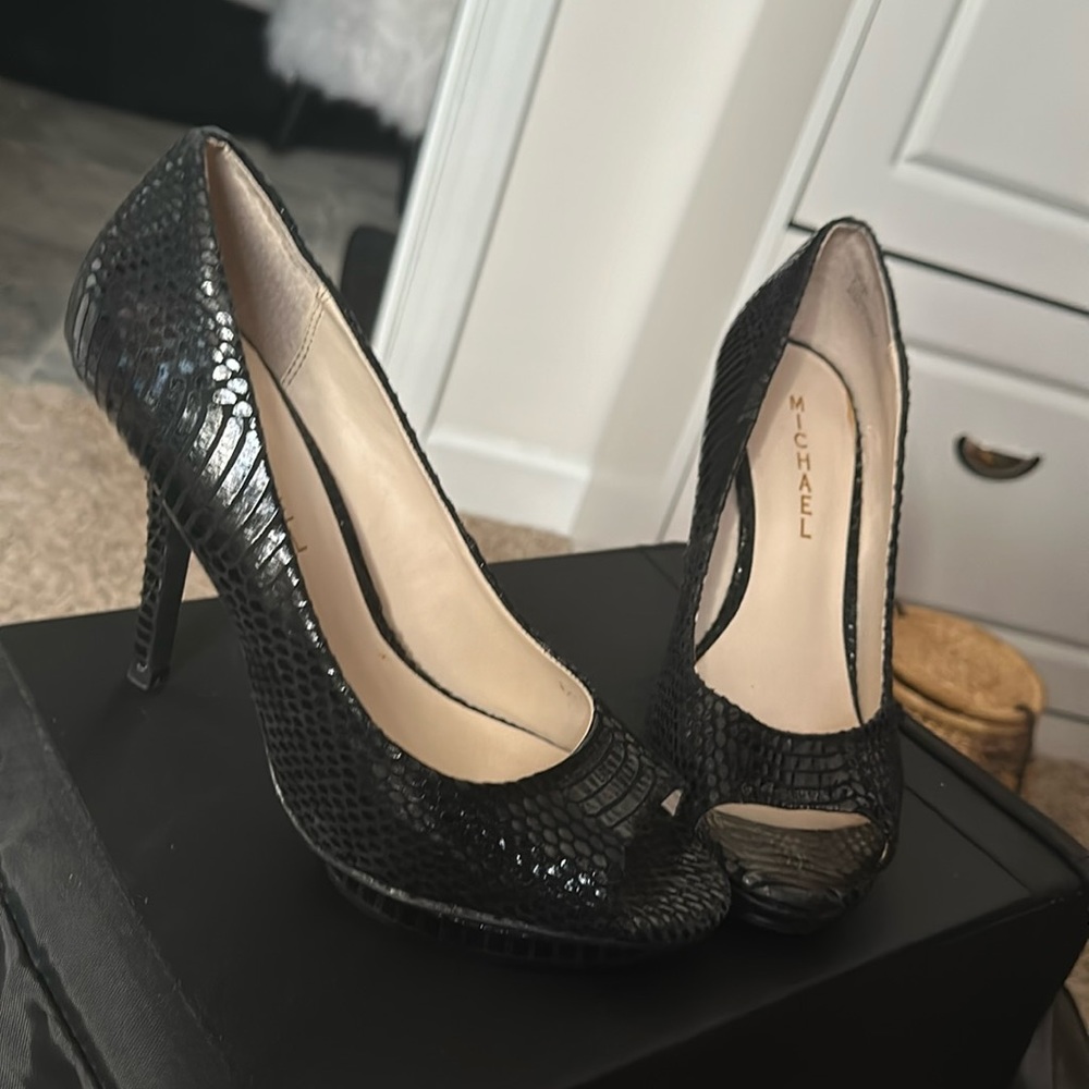 Black snakeskin leather